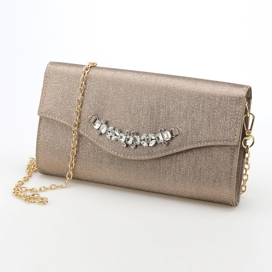 Gold women's toiletry pochette with diamonds